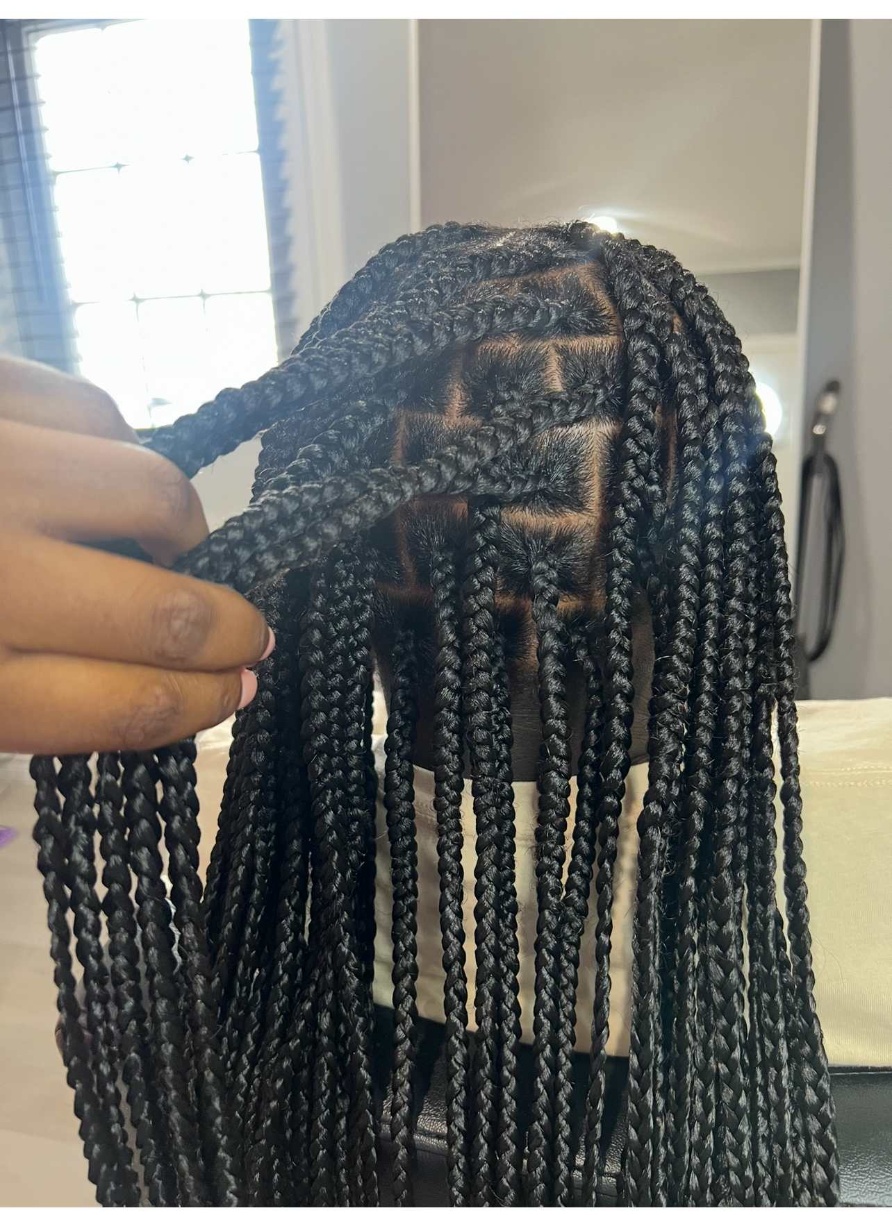 Close-up of neat box braid parts