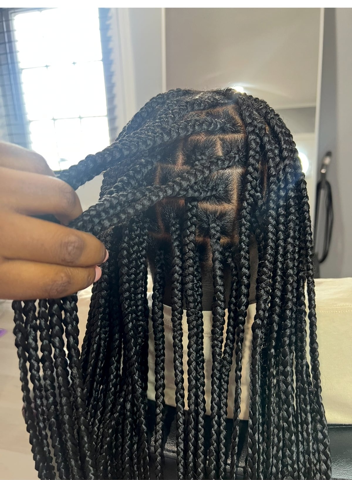 Close-up of neat box braid parts