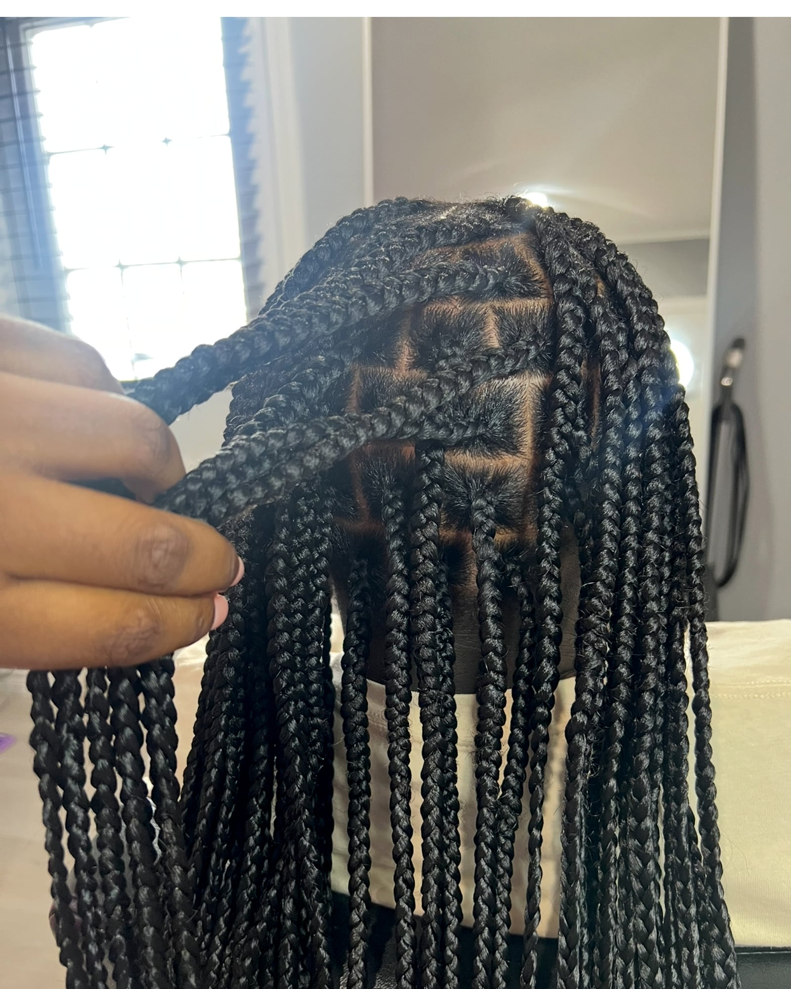 Close-up of neat box braid parts